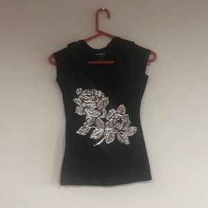 Sparky rose design on black tank top
